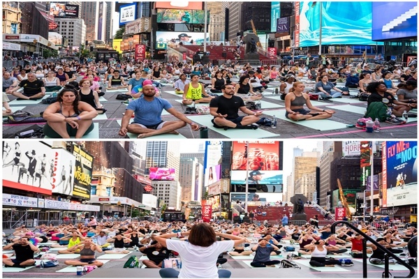 Ten thousand people from different countries perform yoga at Times Square in New York