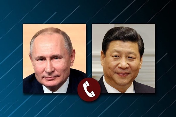 Russian President Putin, Chinese President Xi discuss strategic cooperation