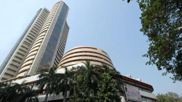 Sensex closes with modest loss, Nifty ends flat