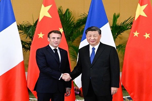 French President meets Xi Jinping in Beijing for talks on Ukraine and trade