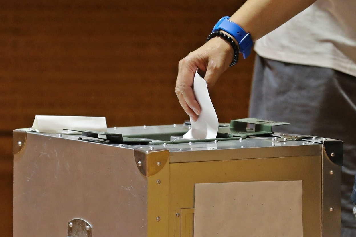Japanese voters cast ballots today in snap parliamentary election