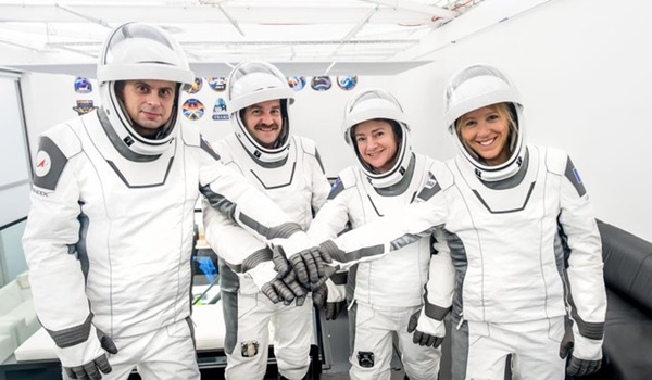Four new astronauts arrive at International Space Station