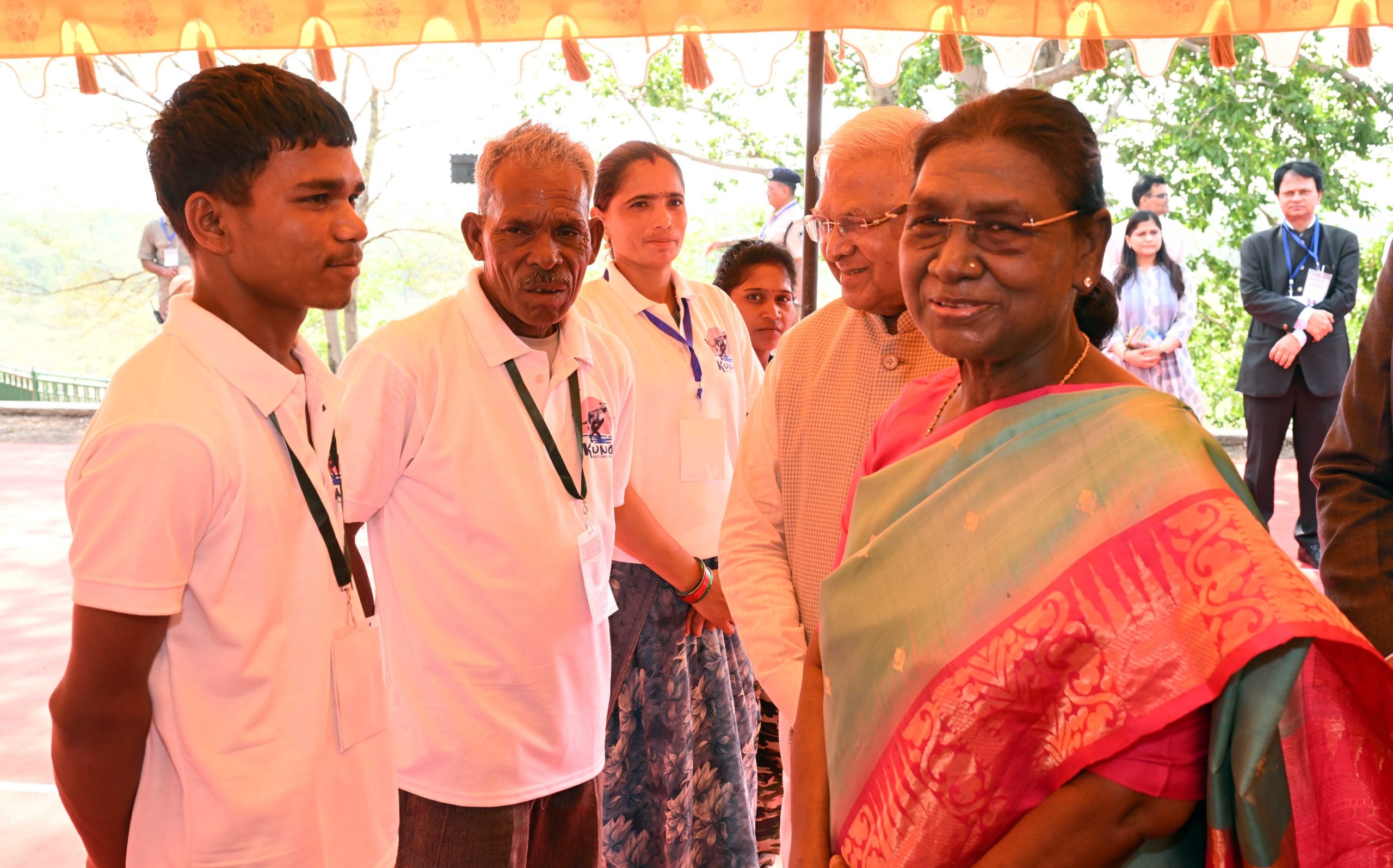 President Droupadi Murmu interacts with Cheetah Mitras and Sahariya tribe members at Kuno National Park