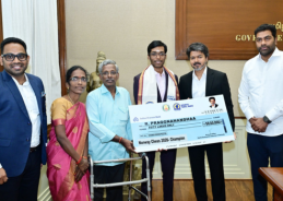 Tamil Nadu CM Vijay presents Rs 50 lakh cheque to Grandmaster Praggnanandhaa for Norway Chess title