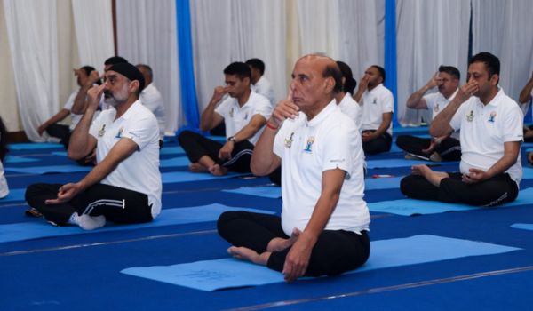 Defence Minister Singh joins International Yoga Day celebrations at Eastern Air Command Headquarters
