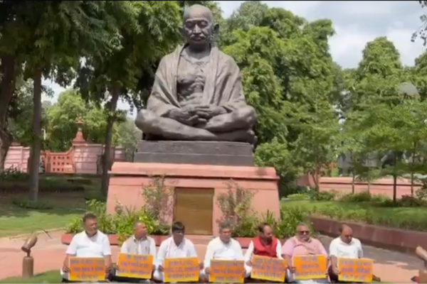 BJP MPs from Jharkhand stage protest in front of Mahatma Gandhi statue at Parliament Premises