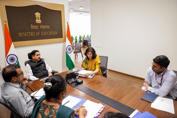 Education Minister reviews implementation of free  online coaching to youth  for competitive examinations
