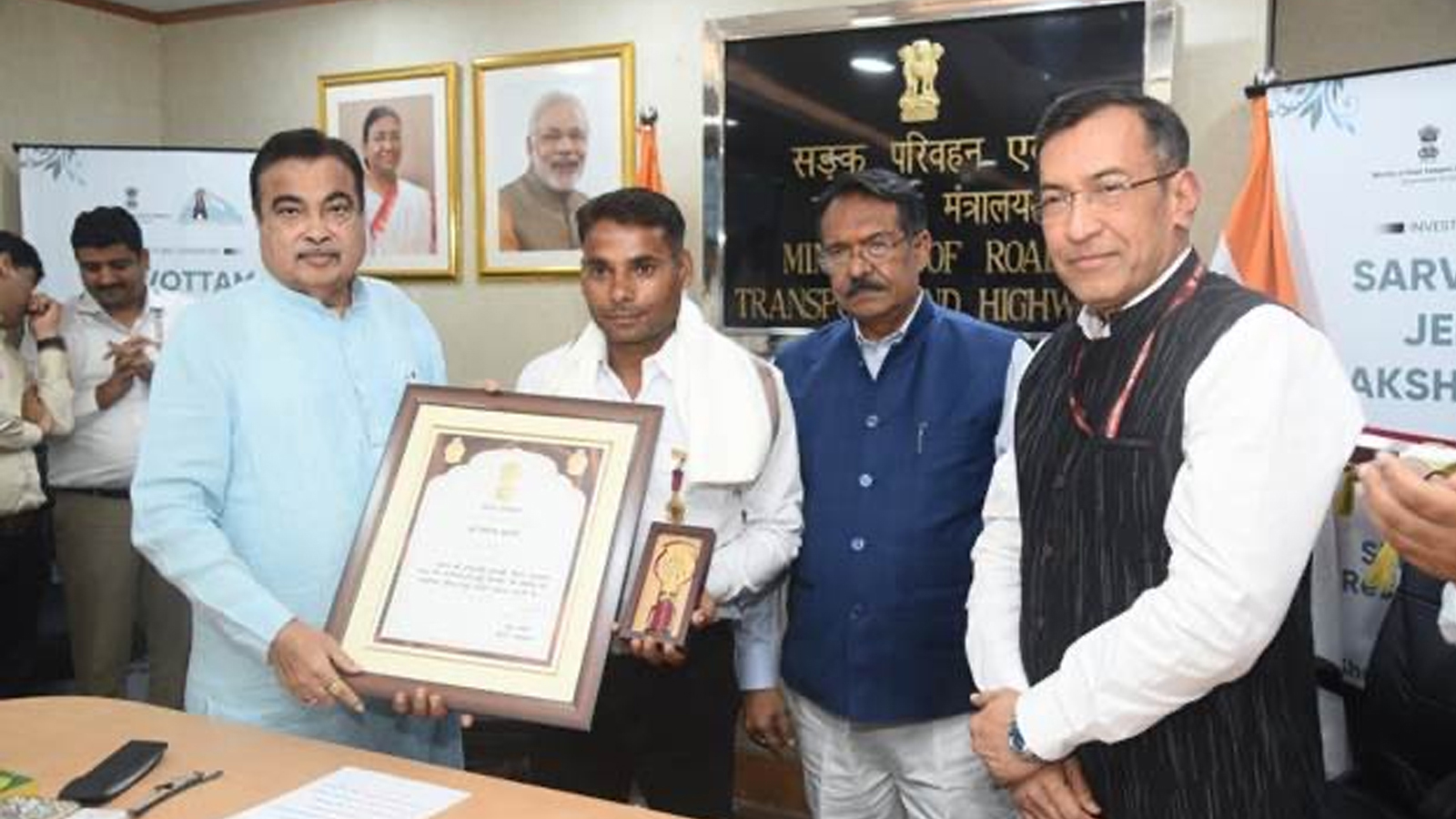 Union Minister Nitin Gadkari confers Sarvottam Jeevan Raksha Padak on 12 rat miners for Silkyara Tunnel rescue