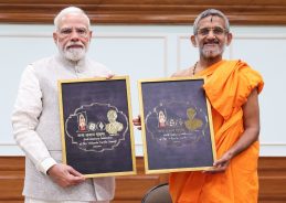PM Modi Unveils Logo for Birth Centenary Celebrations of Sri Vishwesha Tirtha Swamiji